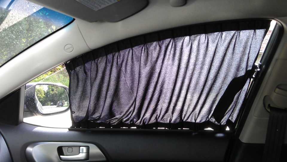 Солнцезащитные шторки на боковые стекла автомобиля, конструкции штор и фото